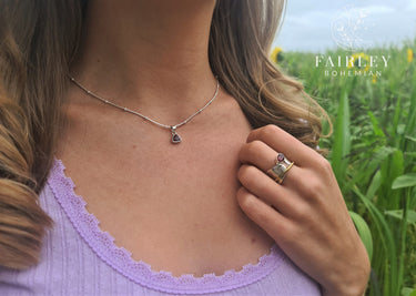 model fields bohemian garnet ring and garnet personalised silver necklace